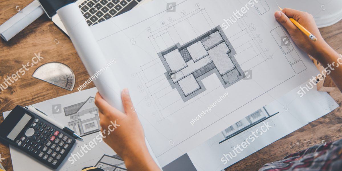 stock-photo-engineer-working-in-office-with-blueprints-inspection-in-workplace-for-architectural-plan-1916898509